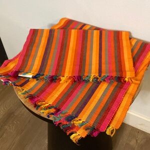 set of four crate and barrel fiesta stripe fringe cotton placemats